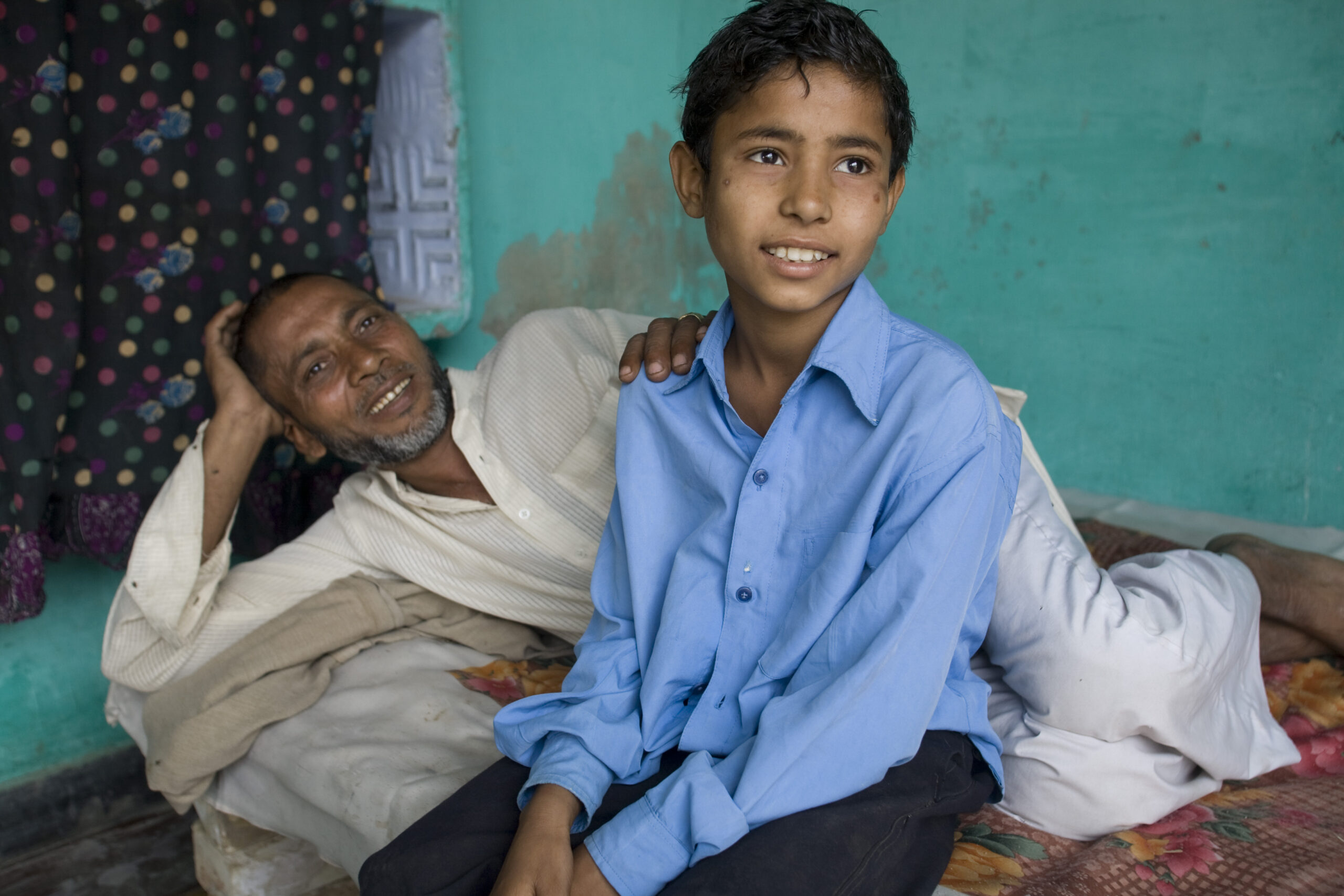 Musarif Ahmad, 10 and his father, Farmana. Gungarala Village, Gaziabad, India